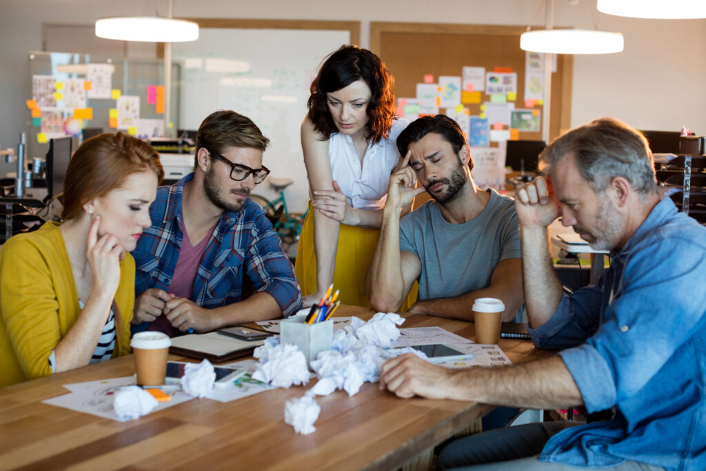 Sales team thinking about their mistakes in sales.